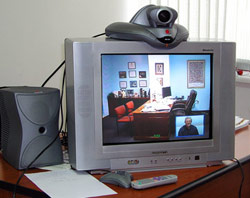 Polycom videoconferencing unit on desk